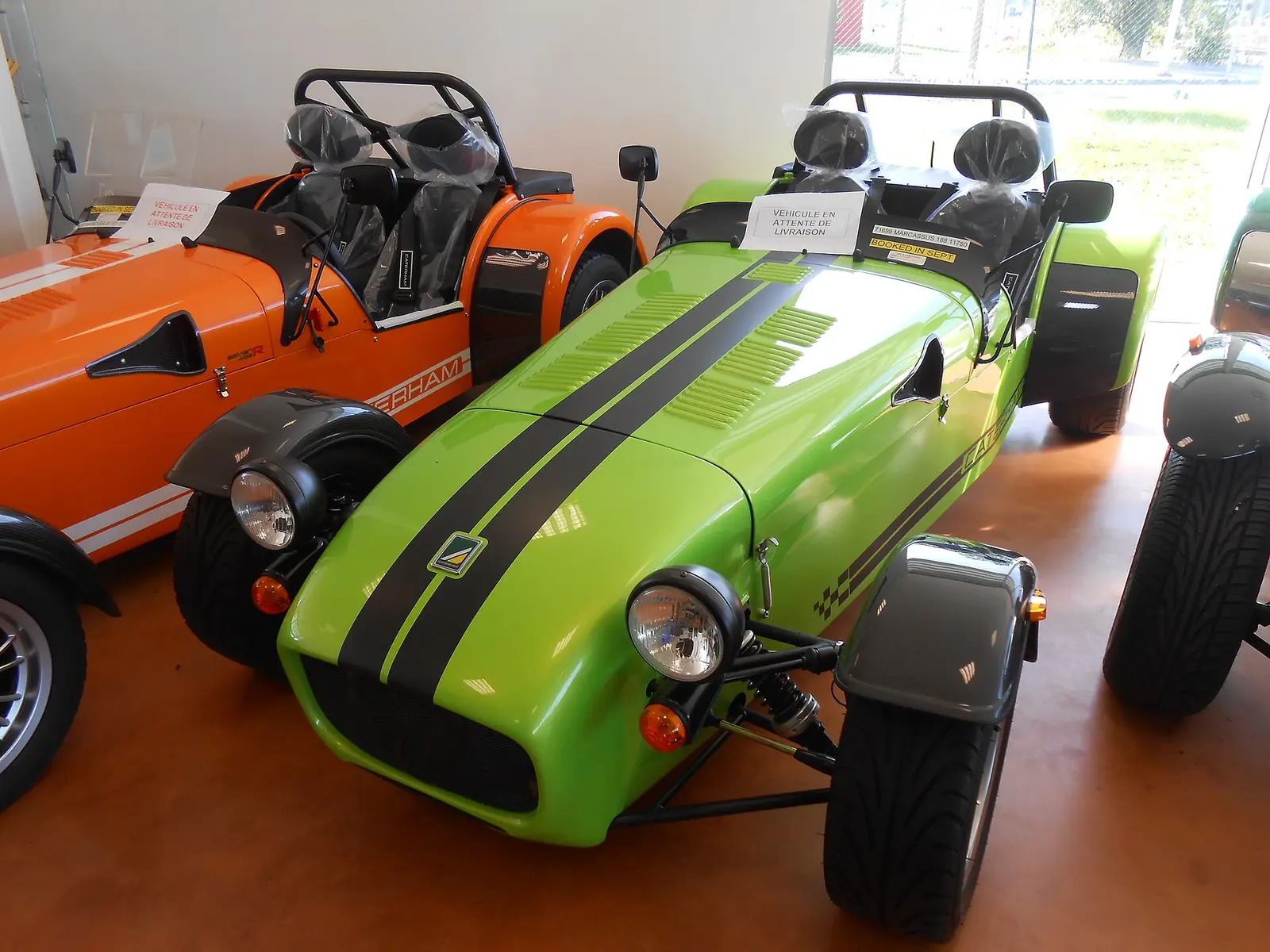 Caterham Seven vehicles in a showroom